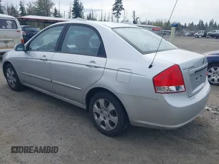 2009 Kia Spectra EX with VIN KNAFE221595659217, listed as a IAAI auction lot 42014406 with 140,527 mi miles. Bid and sale history available at carsss.com. Image 3.