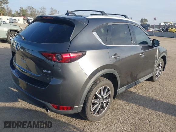 2018 Mazda CX-5 Grand Touring with VIN JM3KFBDM0J0405574, listed as a IAAI auction lot 41725319 with 44,380 mi miles. Bid and sale history available at carsss.com. Image 4.