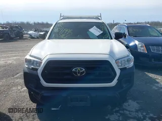 2021 Toyota Tacoma SR with VIN 3TYRX5GN6MT007673, listed as a IAAI auction lot 41691995 with 97,735 mi miles and . Bid and sale history available at DreamBid. Image 12.