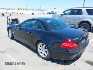 2003 Mercedes-Benz SL 500 z VIN WDBSK75F23F015866, wystawiony jako IAAI lot #42415510 z przebiegiem 141 049 mil mil oraz . Historia ofert i sprzedaży dostępna na DreamBid. Obrazek 3.
