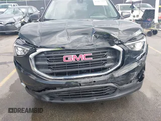 2021 GMC Terrain SLE z VIN 3GKALTEV5ML345992, wystawiony jako IAAI lot #42467280 z przebiegiem 123 704 mil mil oraz . Historia ofert i sprzedaży dostępna na DreamBid. Obrazek 6.