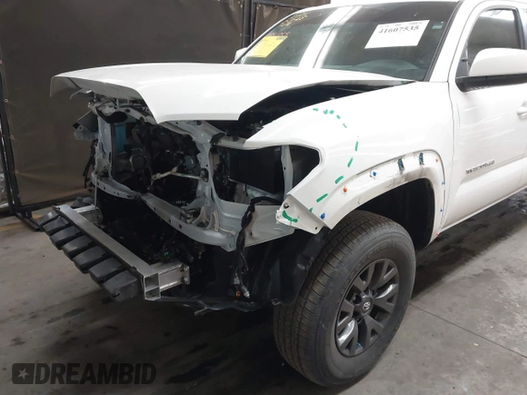 2023 Toyota Tacoma SR5 z VIN 3TYAZ5CN9PT030723, wystawiony jako IAAI lot #41607535 z przebiegiem 40 215 mil mil oraz . Historia ofert i sprzedaży dostępna na DreamBid. Obrazek 6.