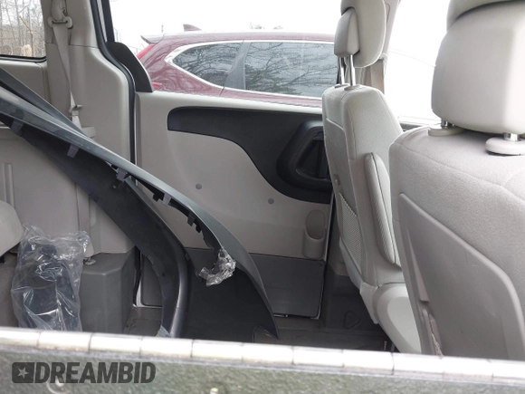 2012 Dodge Grand Caravan SE with VIN 2C4RDGBG9CR232038, listed as a IAAI auction lot 41823766 with 77,468 mi miles and . Bid and sale history available at DreamBid. Image 8.