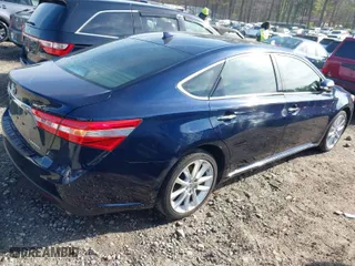 2013 Toyota Avalon XLE with VIN 4T1BK1EB7DU041688, listed as a IAAI auction lot 41869635 with 144,980 mi miles. Bid and sale history available at carsss.com. Image 4.