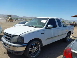1997 Ford F-150 with VIN 1FTDX1764VKB98042, listed as a IAAI auction lot 42442450 with 203,620 mi miles and . Bid and sale history available at DreamBid. Image 2.
