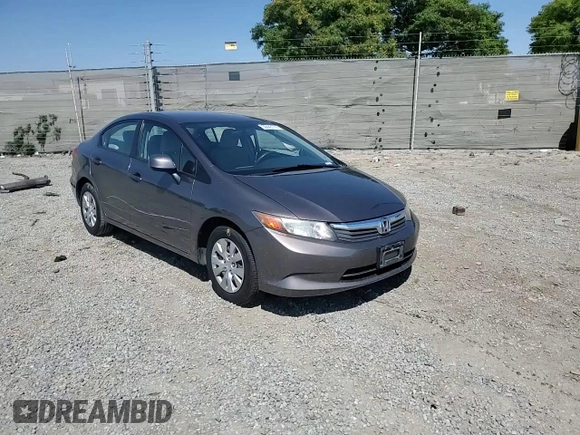 2012 Honda Civic LX z VIN 2HGFB2F5XCH517276, wystawiony jako Copart lot #59443775 z przebiegiem 98 749 mil mil oraz Szkoda całkowita • Salvage title. Historia ofert i sprzedaży dostępna na DreamBid. Obrazek 13.