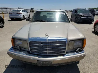 1990 Mercedes-Benz 300 with VIN WDBCA24D1LA529716, listed as a Copart auction lot 56581335 with 122,286 mi miles and Salvage Title. Bid and sale history available at DreamBid. Image 5.