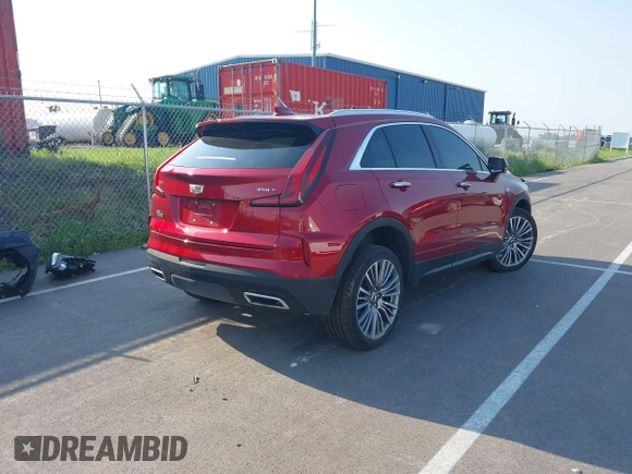 2025 Cadillac XT4 AWD Premium Luxury with VIN 1GYFZDR42SF118428, listed as a IAAI auction lot 42376074 with 13,758 mi miles and . Bid and sale history available at DreamBid. Image 4.