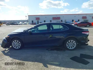 2019 Toyota Camry LE z VIN 4T1B11HK8KU197444, wystawiony jako IAAI lot #41710904 z przebiegiem 137 766 mil mil oraz . Historia ofert i sprzedaży dostępna na DreamBid. Obrazek 14.