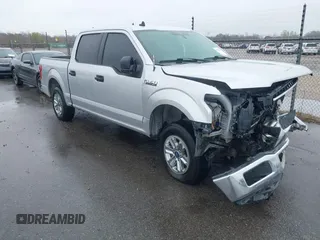 2019 Ford F-150 XL with VIN 1FTEW1CBXKFA20926, listed as a IAAI auction lot 41622704 with 100,440 mi miles and . Bid and sale history available at carsss.com. Image 1.