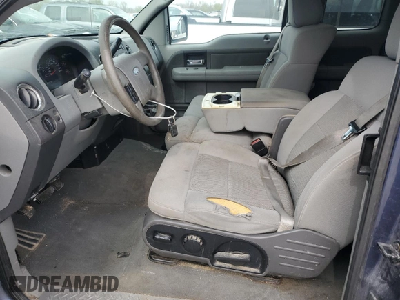 2004 Ford F-150 XL with VIN 1FTPX12564KD89245, listed as a Copart auction lot 52342585 with 187,119 mi miles and Salvage title. Bid and sale history available at DreamBid. Image 7.