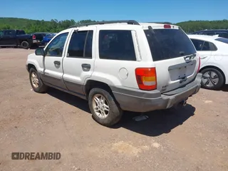 2002 Jeep Grand Cherokee Laredo with VIN 1J4GX48S32C134911, listed as a IAAI auction lot 42323138 with 156,852 mi miles and . Bid and sale history available at DreamBid. Image 3.