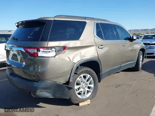 2020 Chevrolet Traverse LT Cloth with VIN 1GNERGKW7LJ112127, listed as a IAAI auction lot 41836681 with 98,575 mi miles. Bid and sale history available at carsss.com. Image 4.