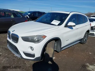 2017 BMW X1 xDrive28i with VIN WBXHT3C37H5F69725, listed as a IAAI auction lot 41588095 with 109,704 mi miles. Bid and sale history available at carsss.com. Image 17.
