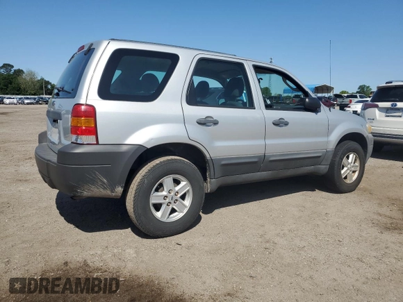 2007 Ford Escape XLS с VIN 1FMYU02Z77KB19323, выставлен на аукционе Copart как лот 52345655 с пробегом 153 509 миль миль и Списание • Salvage title. История ставок и продаж доступна на DreamBid. Изображение 3.