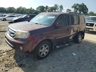 2011 Honda Pilot Touring z VIN 5FNYF3H98BB026484, wystawiony jako Copart lot #62012295 z przebiegiem 123 338 mil mil oraz Szkoda całkowita • Salvage title. Historia ofert i sprzedaży dostępna na DreamBid. Obrazek 1.