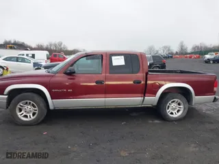 2002 Dodge Dakota SLT with VIN 1B7HL48N62S694380, listed as a IAAI auction lot 42008125 with 152,421 mi miles. Bid and sale history available at carsss.com. Image 6.