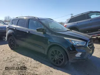 2017 Ford Escape SE with VIN 1FMCU9GD1HUC70739, listed as a Copart auction lot 46060905 with 127,041 mi miles and Clean Title. Bid and sale history available at DreamBid. Image 4.