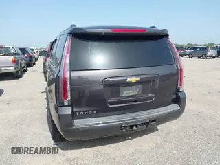 2015 Chevrolet Tahoe LTZ with VIN 1GNSCCKC2FR170090, listed as a IAAI auction lot 42616452 with 249,940 mi miles and . Bid and sale history available at DreamBid. Image 16.