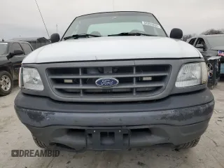 2003 Ford F-150 XL with VIN 1FTRF18W03NA77544, listed as a Copart auction lot 84805894 with Not provided miles and Salvage title. Bid and sale history available at DreamBid. Image 5.
