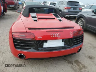 2014 Audi R8 z VIN WUAVNAFG9EN000206, wystawiony jako Copart lot #76712994 z przebiegiem Nie podano mil oraz Nie do naprawy • Non repairable. Historia ofert i sprzedaży dostępna na DreamBid. Obrazek 6.