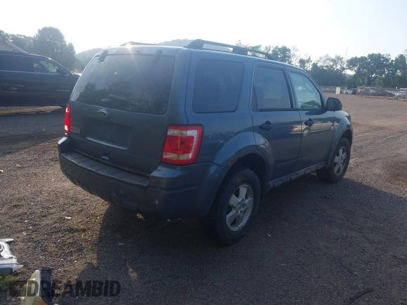 2011 Ford Escape XLT with VIN 1FMCU9D77BKB11600, listed as a IAAI auction lot 42579732 with 147,247 mi miles and . Bid and sale history available at DreamBid. Image 4.