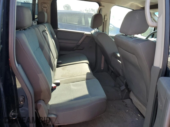 2006 Nissan Titan SE z VIN 1N6AA07A56N500115, wystawiony jako Copart lot #52821355 z przebiegiem 142 583 mil mil oraz Szkoda całkowita • Salvage title. Historia ofert i sprzedaży dostępna na DreamBid. Obrazek 10.