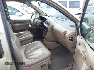 1999 Chrysler Town & Country LXi with VIN 1C4GP54L8XB612991, listed as a IAAI auction lot 41669165 with 199,327 mi miles and . Bid and sale history available at DreamBid. Image 5.