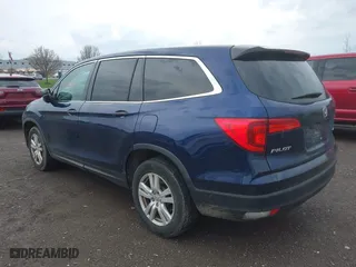 2016 Honda Pilot LX with VIN 5FNYF6H13GB061503, listed as a IAAI auction lot 42096651 with 226,785 mi miles. Bid and sale history available at carsss.com. Image 3.