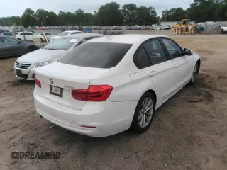 2018 BMW 3 Series 320i with VIN WBA8E1G57JNU91633, listed as a IAAI auction lot 42065119 with 55,062 mi miles. Bid and sale history available at carsss.com. Image 4.