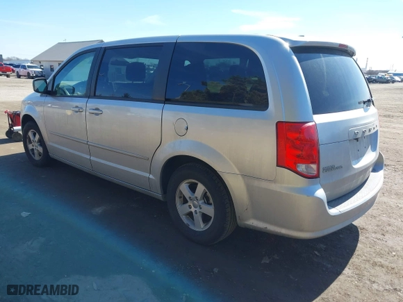 2011 Dodge Grand Caravan Mainstreet with VIN 2D4RN3DG0BR790008, listed as a IAAI auction lot 41701154 with 117,971 mi miles. Bid and sale history available at carsss.com. Image 3.