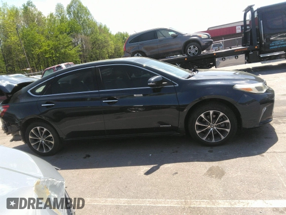 2018 Toyota Avalon Hybrid XLE Plus z VIN 4T1BD1EB1JU062378, wystawiony jako IAAI lot #41988148 z przebiegiem 128 220 mil mil oraz . Historia ofert i sprzedaży dostępna na DreamBid. Obrazek 14.