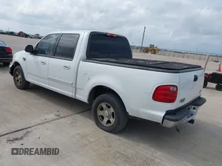 2003 Ford F-150 XLT with VIN 1FTRW07623KD58824, listed as a IAAI auction lot 42124403 with Not Provided miles. Bid and sale history available at carsss.com. Image 3.