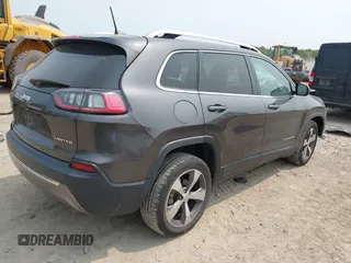 2020 Jeep Cherokee Limited z VIN 1C4PJLDB3LD614479, wystawiony jako IAAI lot #42363037 z przebiegiem 100 767 mil mil oraz . Historia ofert i sprzedaży dostępna na DreamBid. Obrazek 4.