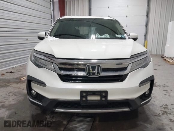 2019 Honda Pilot Touring 7-Passenger with VIN 5FNYF6H64KB005798, listed as a IAAI auction lot 41551933 with 103,151 mi miles. Bid and sale history available at carsss.com. Image 12.