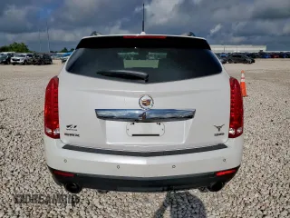 2014 Cadillac SRX Performance Collection with VIN 3GYFNCE39ES687733, listed as a Copart auction lot 62770665 with 151,714 mi miles and Salvage title. Bid and sale history available at DreamBid. Image 6.