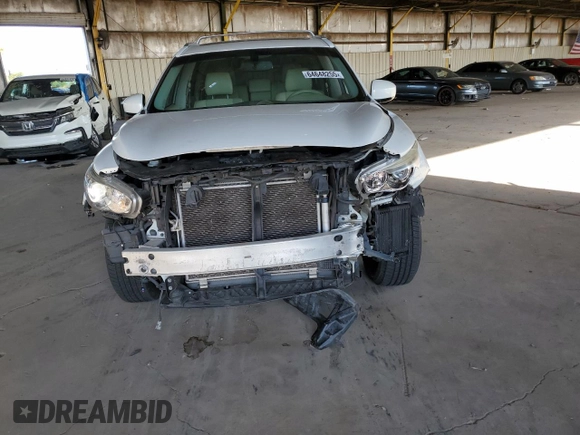 2014 Infiniti QX60 with VIN 5N1AL0MM6EC507768, listed as a Copart auction lot 64648255 with 131,395 mi miles and Salvage title. Bid and sale history available at DreamBid. Image 5.
