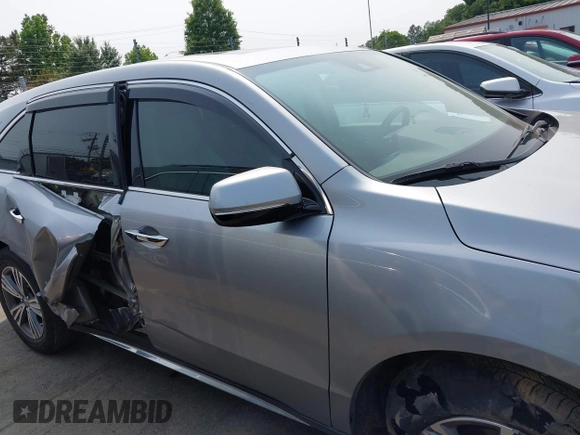 2020 Acura MDX with VIN 5J8YD3H39LL016466, listed as a IAAI auction lot 42376611 with 74,873 mi miles and . Bid and sale history available at DreamBid. Image 13.