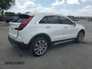 2020 Cadillac XT4 FWD Premium Luxury z VIN 1GYFZCR4XLF005029, wystawiony jako Copart lot #55274025 z przebiegiem 50 550 mil mil oraz Szkoda całkowita • Salvage title. Historia ofert i sprzedaży dostępna na DreamBid. Obrazek 3.