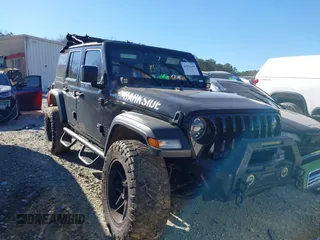 2022 Jeep Wrangler Unlimited Sport with VIN 1C4HJXDNXNW112324, listed as a IAAI auction lot 41376149 with 69,435 mi miles and . Bid and sale history available at DreamBid. Image 1.