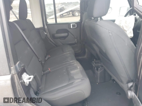 2019 Jeep Wrangler Unlimited Sport Altitude with VIN 1C4HJXDG0KW559807, listed as a IAAI auction lot 41790082 with 34,221 mi miles and . Bid and sale history available at DreamBid. Image 8.
