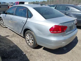 2014 Volkswagen Passat Wolfsburg Ed with VIN 1VWAT7A33EC069166, listed as a IAAI auction lot 41789666 with 226,161 mi miles. Bid and sale history available at carsss.com. Image 3.
