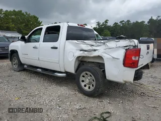 2013 Chevrolet Silverado 1500 LT with VIN 3GCPCSEA8DG237890, listed as a Copart auction lot 64668184 with 196,804 mi miles and Salvage Title. Bid and sale history available at DreamBid. Image 2.