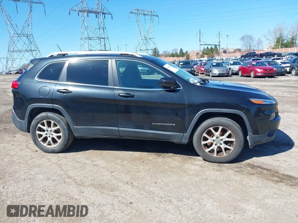 2015 Jeep Cherokee Latitude z VIN 1C4PJMCS2FW620113, wystawiony jako IAAI lot #41865228 z przebiegiem 186 983 mil mil oraz . Historia ofert i sprzedaży dostępna na DreamBid. Obrazek 14.