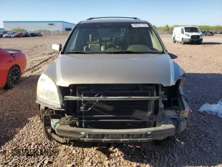 2005 Honda Pilot EX-L z VIN 5FNYF18525B064752, wystawiony jako Copart lot #56022115 z przebiegiem 221 161 mil mil oraz Szkoda całkowita • Salvage title. Historia ofert i sprzedaży dostępna na DreamBid. Obrazek 5.