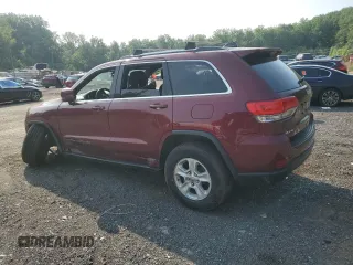 2017 Jeep Grand Cherokee Laredo with VIN 1C4RJFAG8HC940849, listed as a Copart auction lot 59868025 with 111,743 mi miles and Salvage title. Bid and sale history available at DreamBid. Image 2.