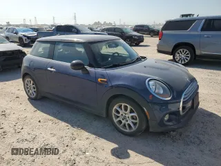 2014 MINI Hardtop with VIN WMWXM5C59ET972044, listed as a Copart auction lot 52519775 with 91,490 mi miles and Clean Title. Bid and sale history available at DreamBid. Image 4.
