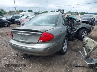 2003 Ford Taurus SES Standard with VIN 1FAFP55293A193556, listed as a IAAI auction lot 42562880 with 144,902 mi miles and . Bid and sale history available at DreamBid. Image 4.