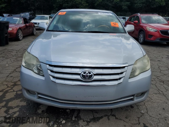 2007 Toyota Avalon XL z VIN 4T1BK36B47U186914, wystawiony jako Copart lot #60364125 z przebiegiem 239 293 mil mil oraz Czysty tytuł • Clean title. Historia ofert i sprzedaży dostępna na DreamBid. Obrazek 5.