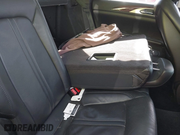 2015 Lincoln MKZ with VIN 3LN6L2G9XFR607285, listed as a IAAI auction lot 41572389 with 138,899 mi miles and . Bid and sale history available at DreamBid. Image 8.